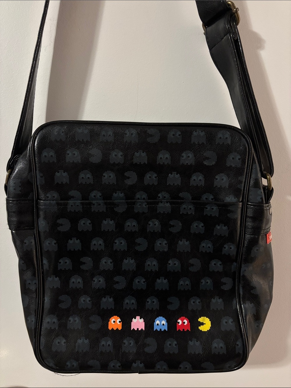 Black Pac-Man Icon Messenger Bag with Colorful Character Accents